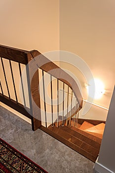 Brown wooden stairs in modern house.