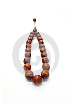 Brown Wooden Tasbih Islamic Prayer Beads Photo Isolated on White Background photo