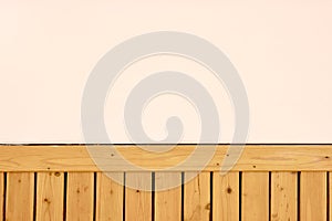 Brown wooed fence and gray wall
