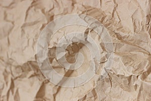 Brown wrinkle recycle paper background. Texture of crumpled paper. Texture of rumpled old paper close-up