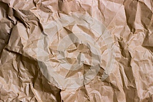 Brown wrinkle recycle paper background. Texture of crumpled paper. Texture of rumpled old paper close-up