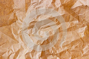 Brown wrinkle recycle paper background. Texture of crumpled paper. Texture of rumpled old paper close-up