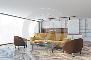 Brown and yellow apartment with sofa and kitchen, furniture on wooden parquet