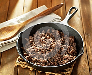 Browned ground beef in cast iron skillet