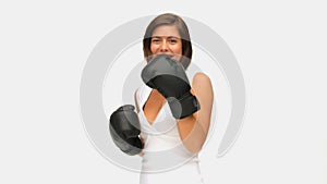 Brownhaired lady with boxing gloves