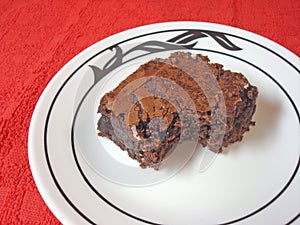 Brownie on a white plate set o
