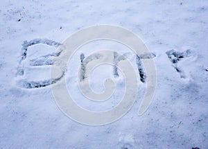 Brrr written in the freshly fallen snow photo