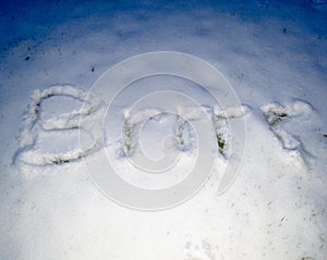 Brrr written in the freshly fallen snow photo