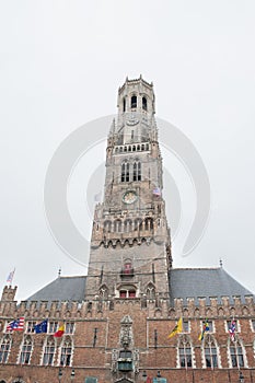 Bruges, Belgium - August 7 2012. Beffroi tower in Grand Place