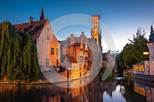 Bruges, Belgium - Evening Time in Historic Center of Bruges with the View of the Bell Tower UNESCO World Heritage