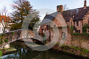 Bruges, Belgium iconic medieval houses, towers and Bonifacius Bridge. Classic postcard view of the historic city center. Often ref