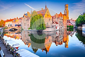 Bruges, Belgium. Rozenhoedkaai Canal in downtown of Brugge, sunrise colors. Famous Flanders destination