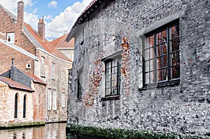Bruges, Belgium View of the medieval buildings that are crossed by the city\'s canals photo