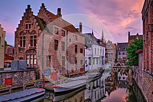 Bruges canal and houses at sunset. Brugge famous place, Belgium