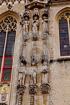 Bruges, Flanders, Belgium, Europe - October 1, 2019. Details of facades medieval old brick houses on the ancient streets in