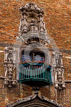 Bruges, Flanders, Belgium, Europe - October 1, 2019. Details of facades medieval old brick houses on the ancient streets in