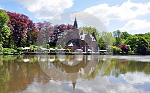 Bruges historic building reflection on lake