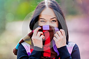 Brunet girl with colorful scarf