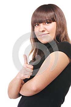 Brunette in black thumb up sideview