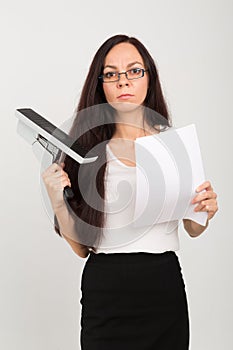 Brunette business lady with big stapler and papers