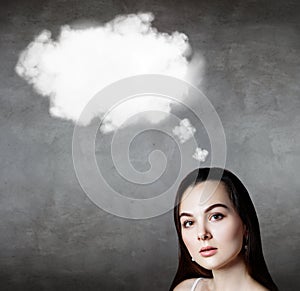 Brunette business woman with empty cloud over head.