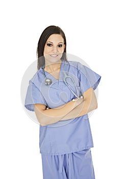 Brunette Caucasian woman doctor or nurse wearing blue scrubs