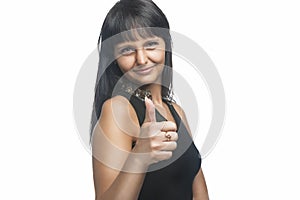 Brunette Caucasian Woman Making Thumbs Up Sign
