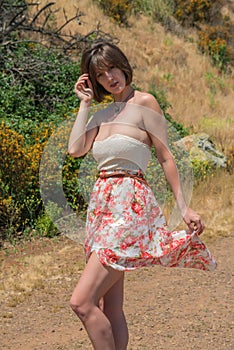 Brunette on a dirt road