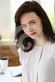 Brunette female, office clerk, presentable outfit, secretary lady on workplace