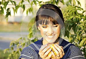 Brunette girl and apple