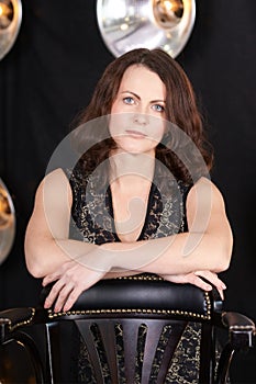 Brunette girl. Beautiful portrait. Black background