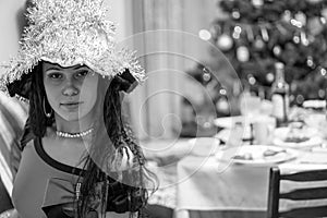 Brunette girl face in witch costume. Black and white