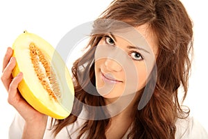 Brunette girl with Honeydew melon