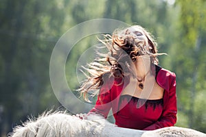 Brunette girl and horse