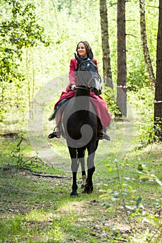 Brunette girl on horse