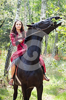 Brunette girl on horse