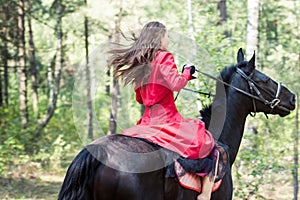 Brunette girl on horse