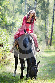 Brunette girl on horse