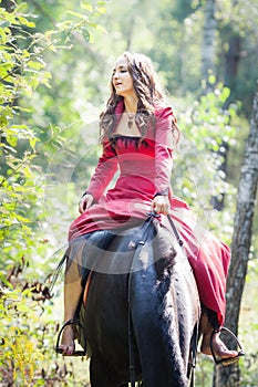 Brunette girl on horse