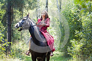 Brunette girl on horse