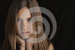 Brunette Girl Resting Chin On Hands