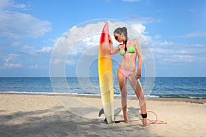 Brunette Girl with a Surfboard