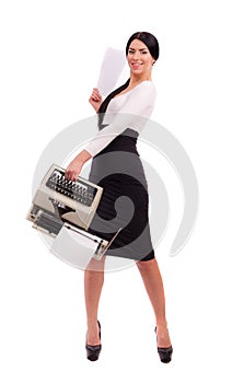 Brunette girl with a typewriter