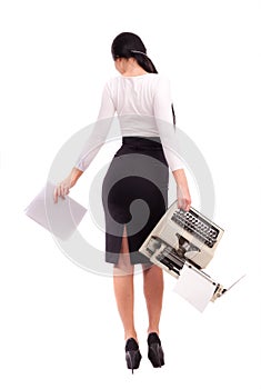 Brunette girl with a typewriter