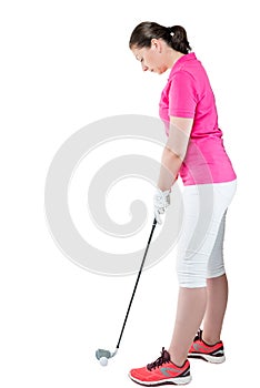 brunette golfer in full length plays golf on a white