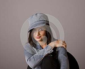 Brunette Hand on Shoulder in Denim Jacket and Cap