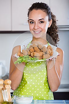 Brunette with home-made croquettes