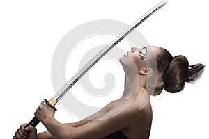 Brunette in japan style with katana in profile
