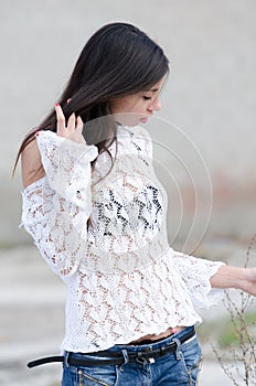 Brunette lady wear white gauzy shirt