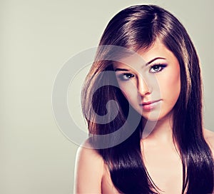 Brunette with long straight hair.